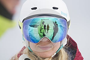 Kaltenbach Ã¢â¬â¹Hochfugen, Austria - 11 Jan, 2020: Glare of a group of snowboarders in a ski mask of a girl in a helmet